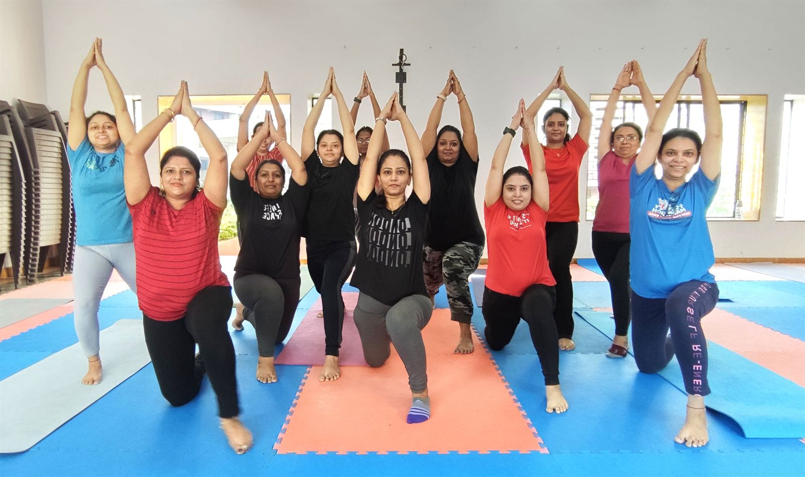Group yoga session with students